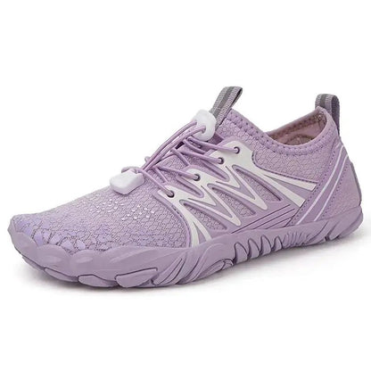 Lavender barefoot shoe with lace closure, knit upper, and cushioned flexible sole