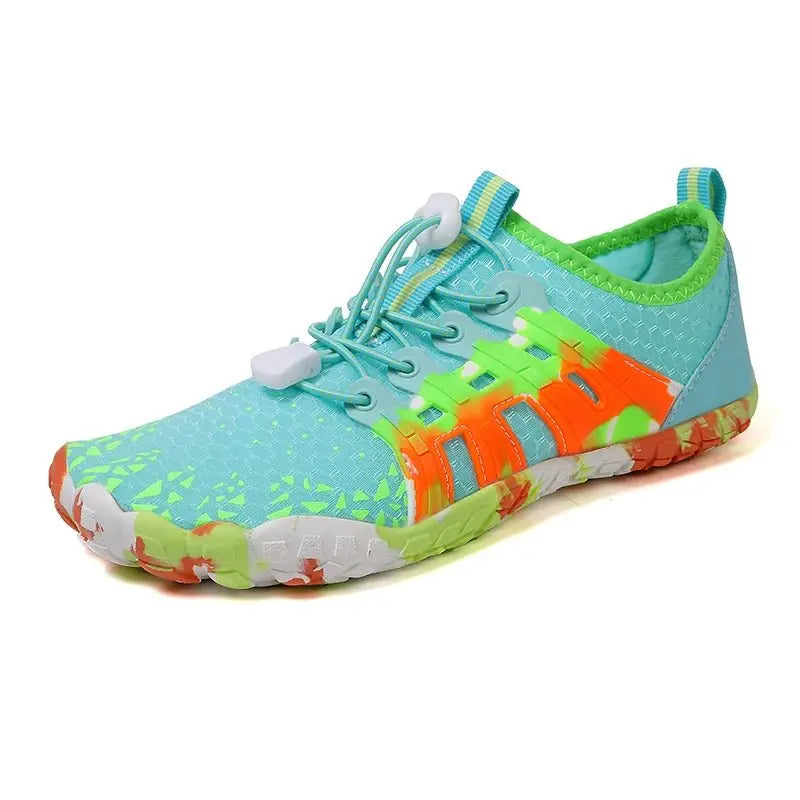Light blue barefoot sneaker with lace-up closure, neon orange accents, grippy sole
