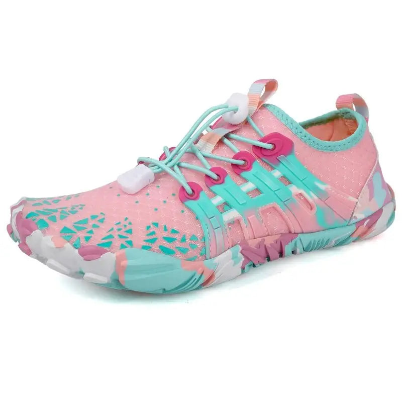Pink and teal barefoot sneaker with lace-up closure and cushioned grippy tread sole