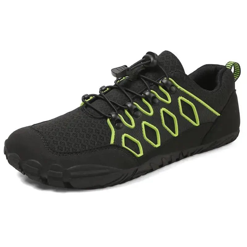 Black knit barefoot shoe with neon green lace accents and black rubber sole