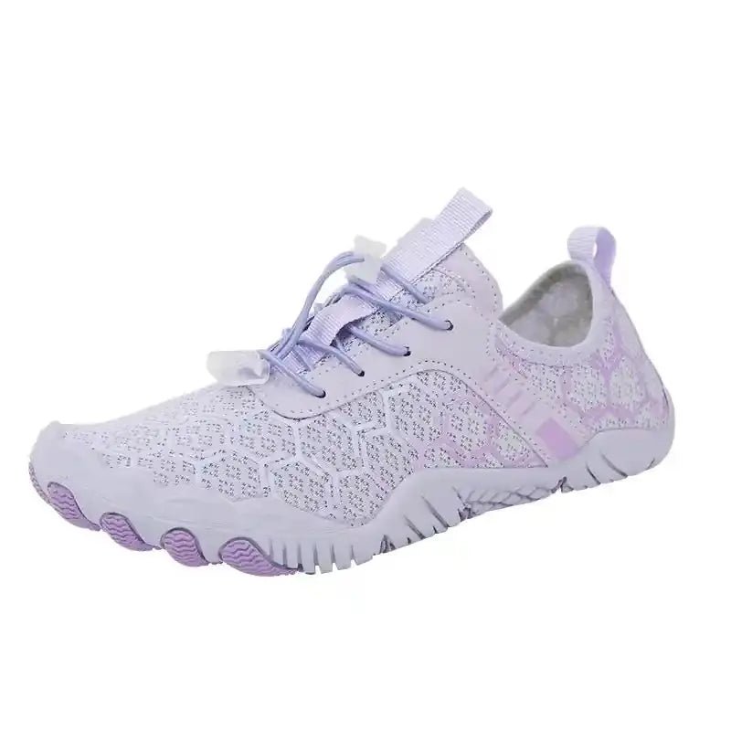 Light lavender barefoot shoe with lace-up closure and purple hex-pattern outsole.