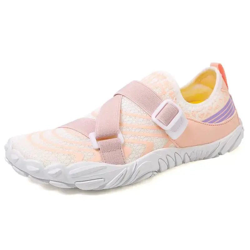 Peach slip-on barefoot shoe with pink strap and textured cushioned sole