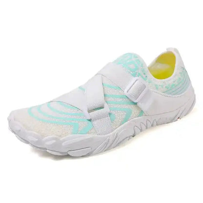 White slip-on barefoot shoe with mint accents and wide hook-and-loop strap